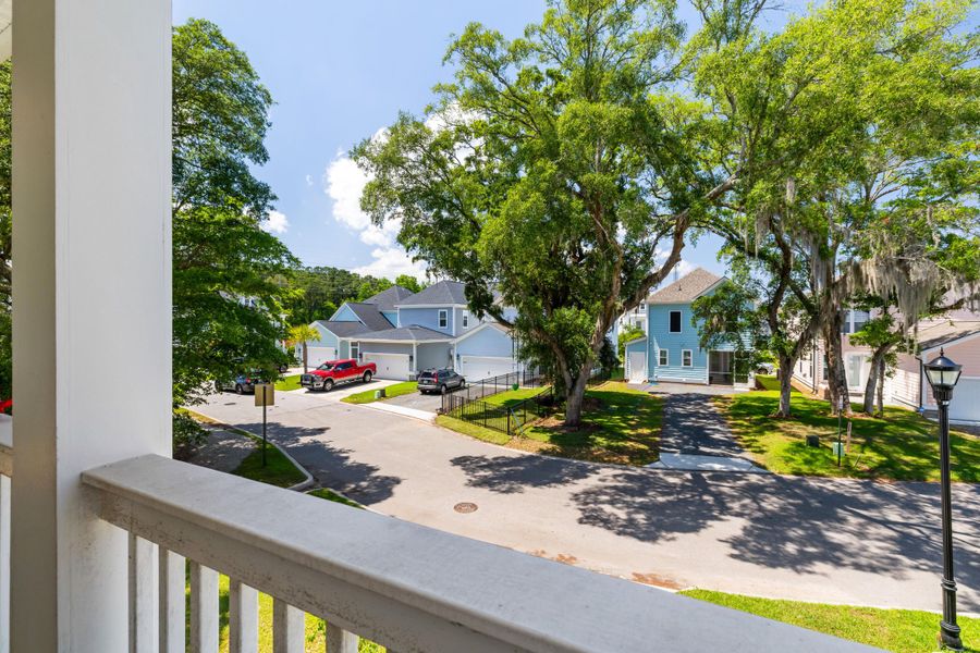 Exterior details and patio area of a home in Oak Bluff, Charleston (Image 29).