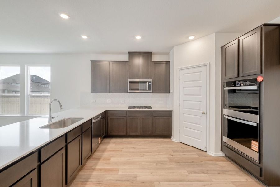 Furnished interior view inside a new home in River Bluff, Leander (Image 4).