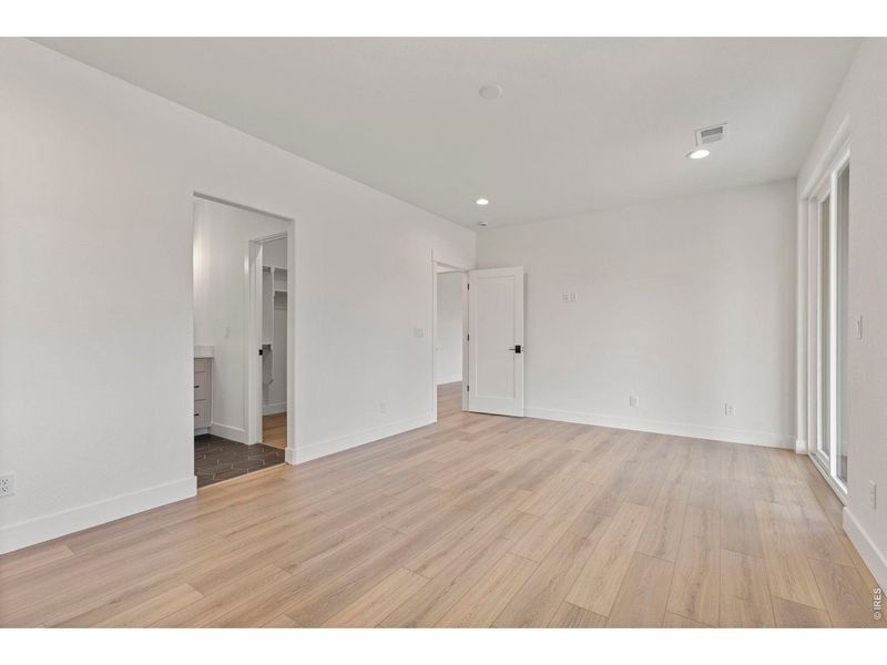 Spacious, unfurnished interior of a new home in RainDance, Windsor (Image 44).