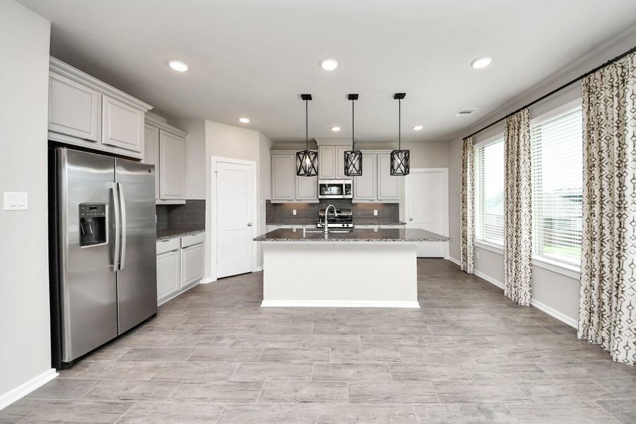 Furnished interior view inside a new home in The Groves, Humble (Image 8).