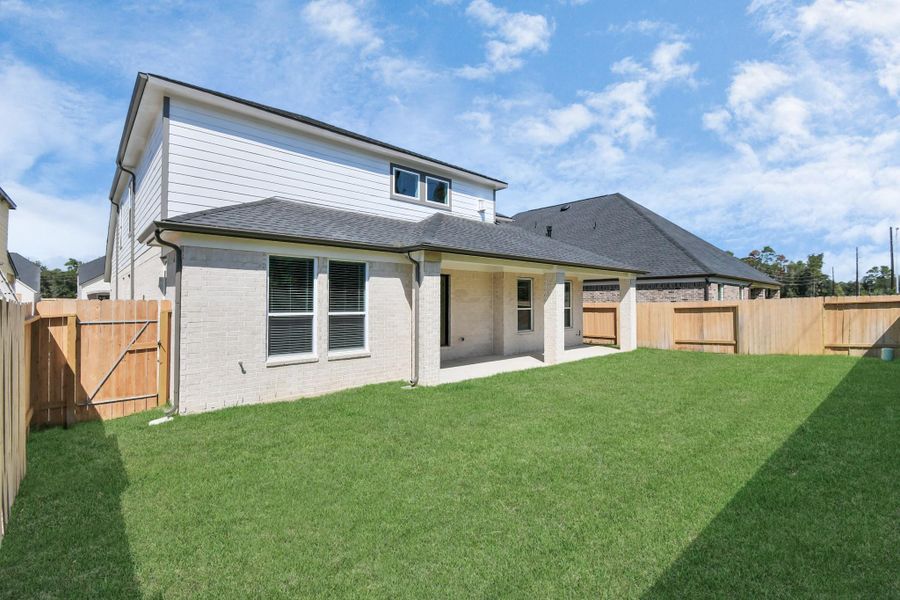 Backyard retreat, offering an abundance of space for kids to play and explore. The possibilities are endless in this outdoor haven, where the joy of open-air activities and family gatherings awaits. Backyard retreat, offering an abundance of space for kids to play and explore. The possibilities are endless in this outdoor haven, where the joy of open-air activities and family gatherings awaits.