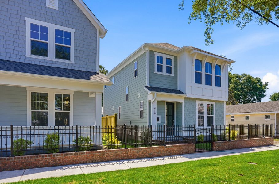Representative exterior photo of a completed home built from the The Remington by RobuckHomes in Downtown Wilmington Collective, Wilmington, NC (Image 38). Representative exterior photo of a completed home built from the The Remington by RobuckHomes in Downtown Wilmington Collective, Wilmington, NC (Image 38).