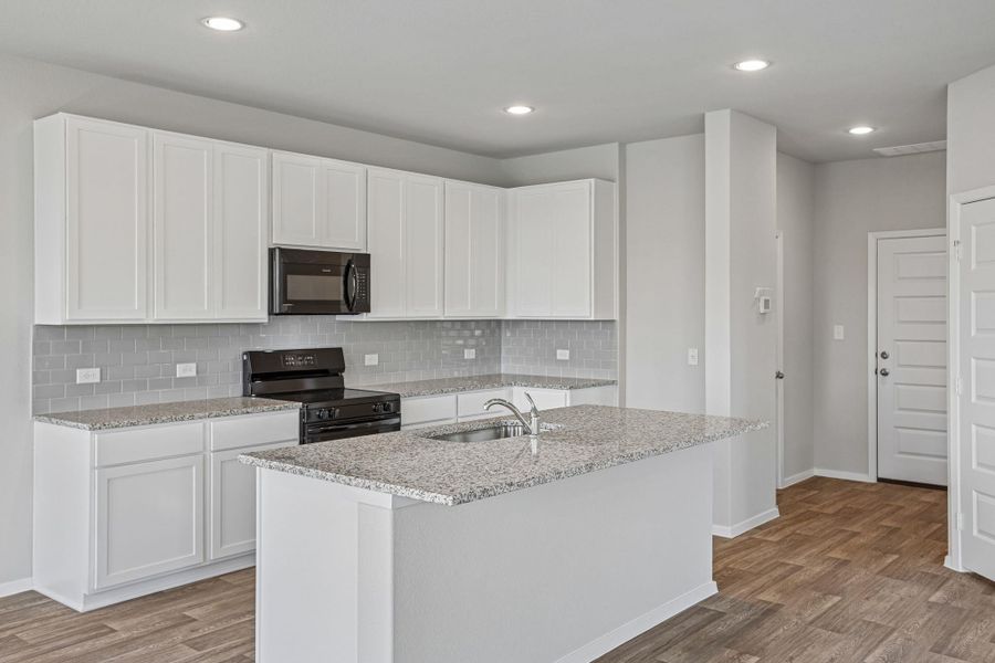 Furnished interior view inside a new home in Edgebrooke, Pflugerville (Image 5).