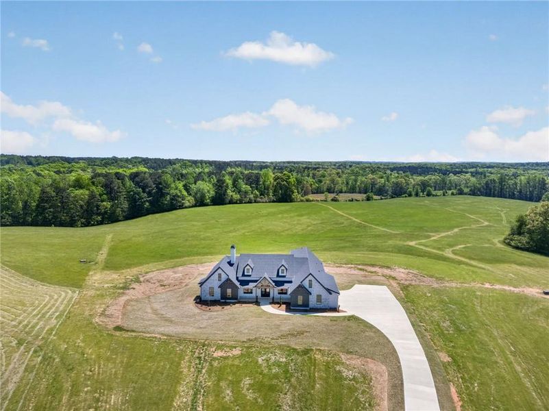 Front exterior of a new home in The Meadows at Lake Circle, Buchanan, GA, highlighting curb appeal (Image 29).