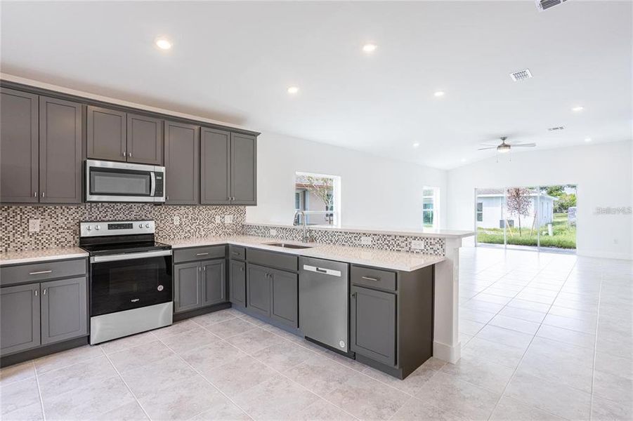 Furnished interior view inside a new home in , Port Charlotte (Image 11). Furnished interior view inside a new home in , Port Charlotte (Image 11).
