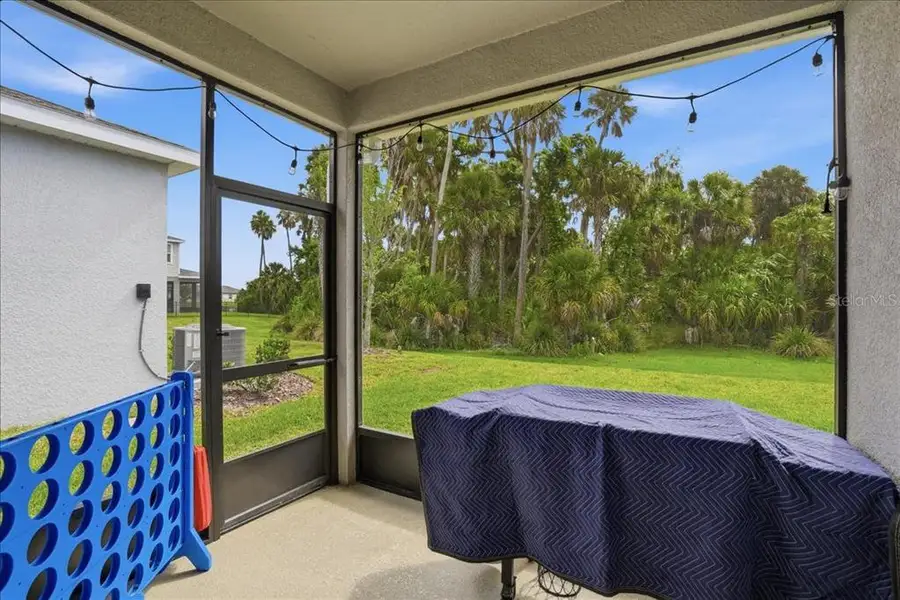 Exterior details and patio area of a home in , Parrish (Image 4).