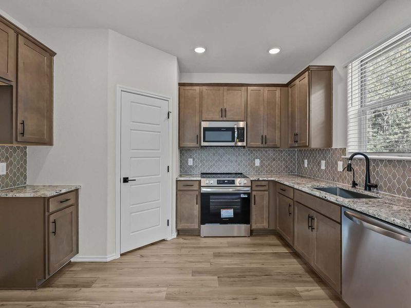 Representative furnished interior of a home built from the The Florence B by Davidson Homes LLC in Cedar Heights, San Antonio (Image 6).