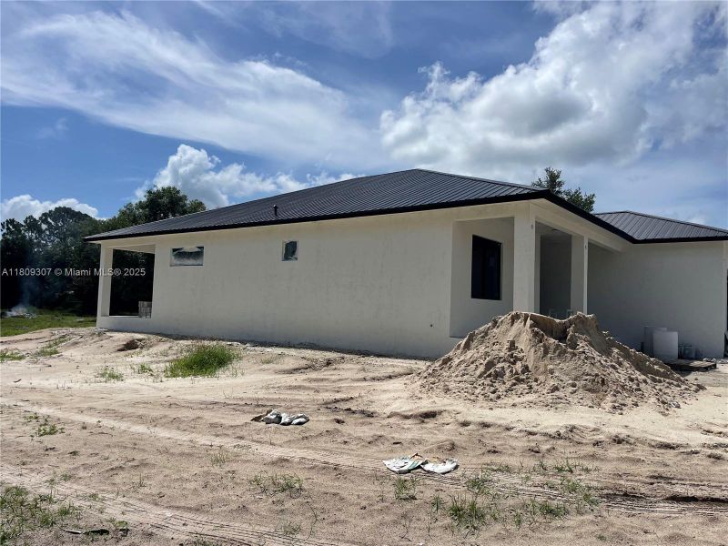 Front exterior of a new home in , Clewiston, FL, highlighting curb appeal (Image 15). Front exterior of a new home in , Clewiston, FL, highlighting curb appeal (Image 15).