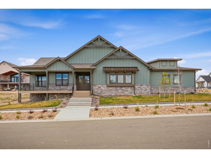 Front exterior of a new home in , Berthoud, CO, highlighting curb appeal (Image 26).