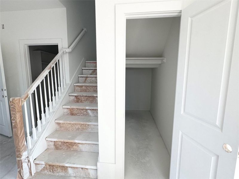 Staircase with unfinished concrete floors Staircase with unfinished concrete floors