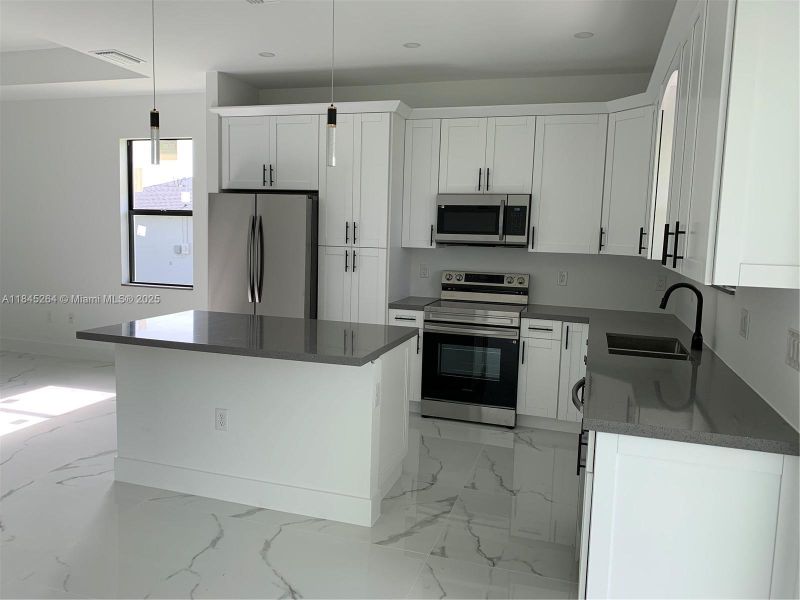 Furnished interior view inside a new home in , Lehigh Acres (Image 9).