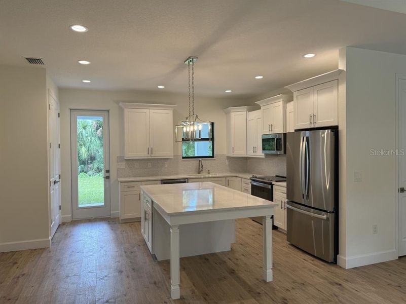 Furnished interior view inside a new home in , Port Charlotte (Image 5).