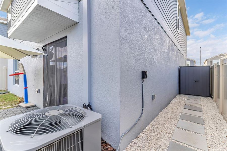 Exterior details and patio area of a home in Peace Creek Reserve: Legacy Collection, Winter Haven (Image 25). Exterior details and patio area of a home in Peace Creek Reserve: Legacy Collection, Winter Haven (Image 25).