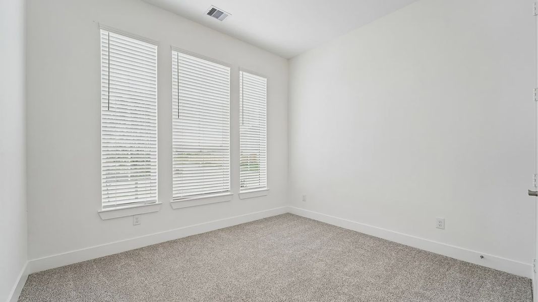 Representative unfurnished interior of a home built from the Cayman by Chesmar Homes in Crescent Bluff, Georgetown (Image 25).