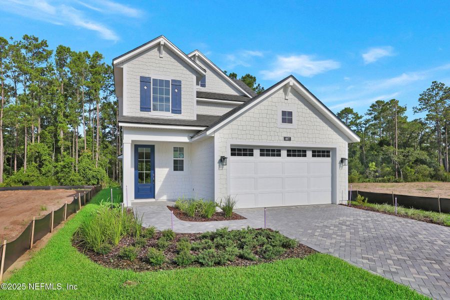 Front exterior of a new home in Reflections at Nocatee, Nocatee, FL, highlighting curb appeal (Image 21).