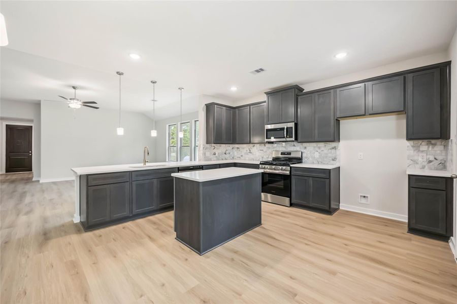 Furnished interior view inside a new home in Deer Pines, Conroe (Image 8).