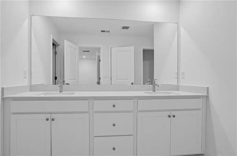 Furnished interior view inside a new home in Towns at Holly Springs, Holly Springs (Image 10).