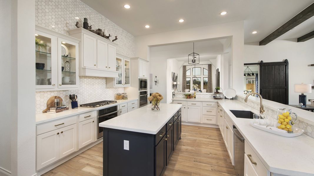 Representative furnished interior of a home built from the 3578W by Perry Homes in Lakes of Cane Island, Katy (Image 37).