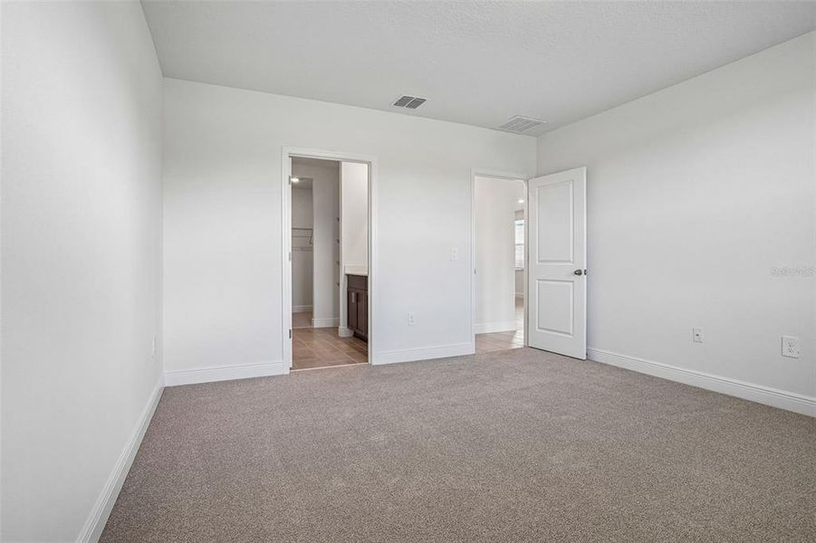 Spacious, unfurnished interior of a new home in The Reserve at Hammock Oaks - Classic Series, Lady Lake (Image 34). Spacious, unfurnished interior of a new home in The Reserve at Hammock Oaks - Classic Series, Lady Lake (Image 34).