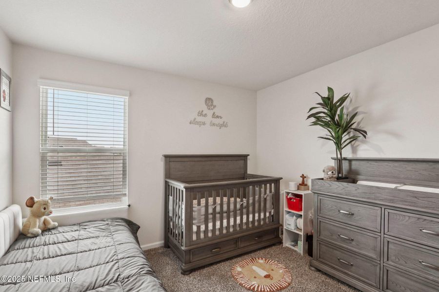 Furnished interior view inside a new home in Cross Creek Express, Green Cove Springs (Image 35).