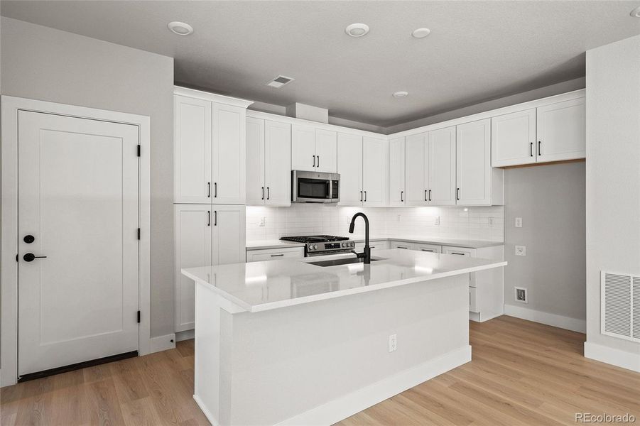 Furnished interior view inside a new home in , Littleton (Image 5).