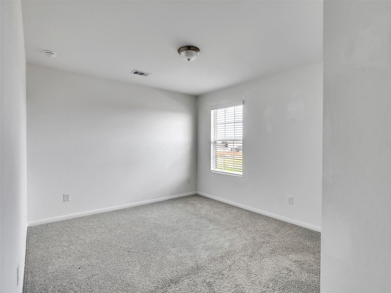 Spacious, unfurnished interior of a new home in Sweetgrass Village, Barrett (Image 17).