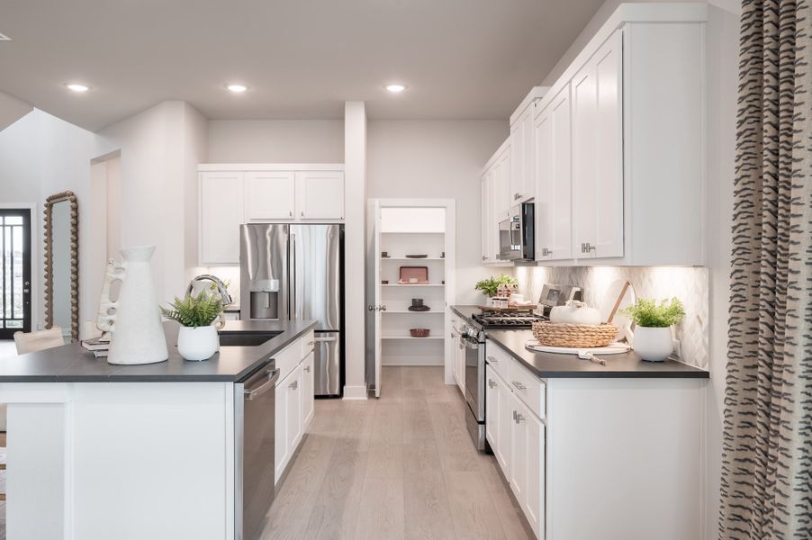 Representative furnished interior of a home built from the Cormorant by Tri Pointe Homes in Trillium, Richmond (Image 34).