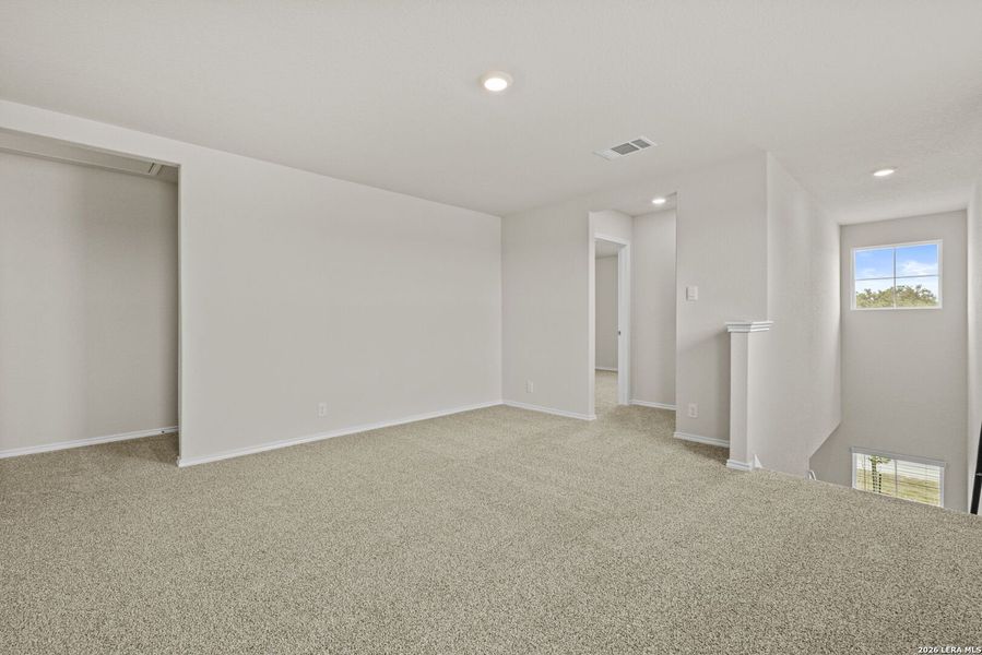 Spacious, unfurnished interior of a new home in Redbird Ranch, San Antonio (Image 12).