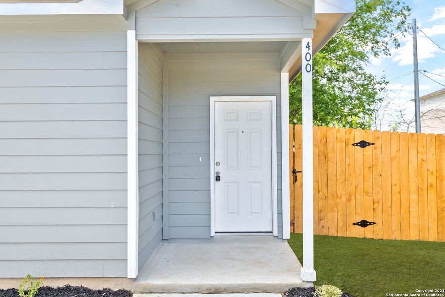 Front exterior of a new home in , Seguin, TX, highlighting curb appeal (Image 18).