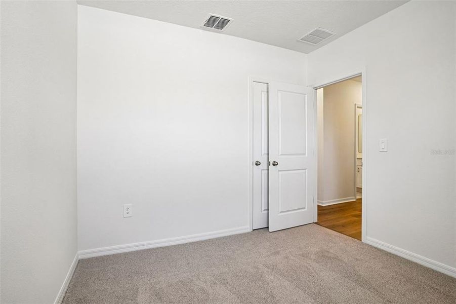 Spacious, unfurnished interior of a new home in Ridgehaven - Villas, Ormond Beach (Image 32).