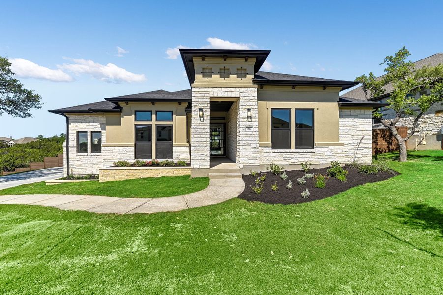 Representative exterior photo of a completed home built from the Sapphire by Giddens Homes in Riverstone, Georgetown, TX (Image 29).