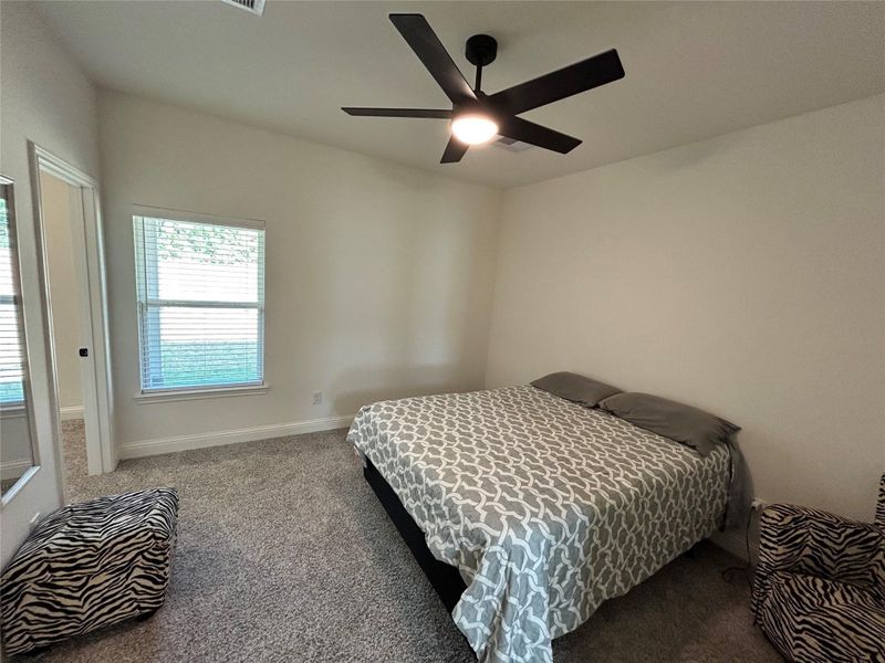 Furnished interior view inside a new home in Spring Branch Crossing, Conroe (Image 10).