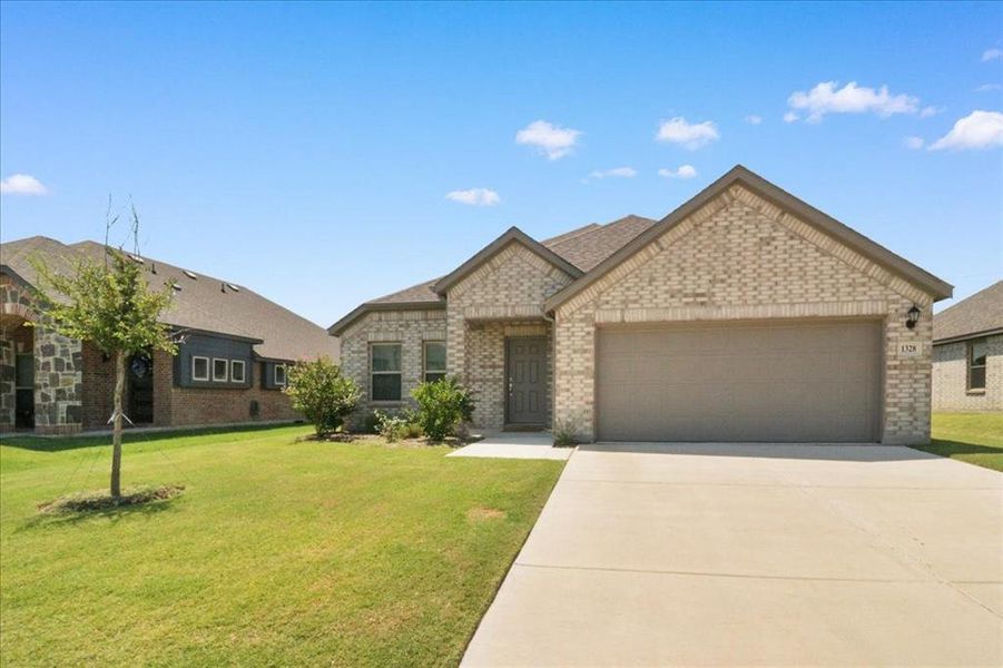 Front exterior of a new home in , Crowley, TX, highlighting curb appeal (Image 14). Front exterior of a new home in , Crowley, TX, highlighting curb appeal (Image 14).