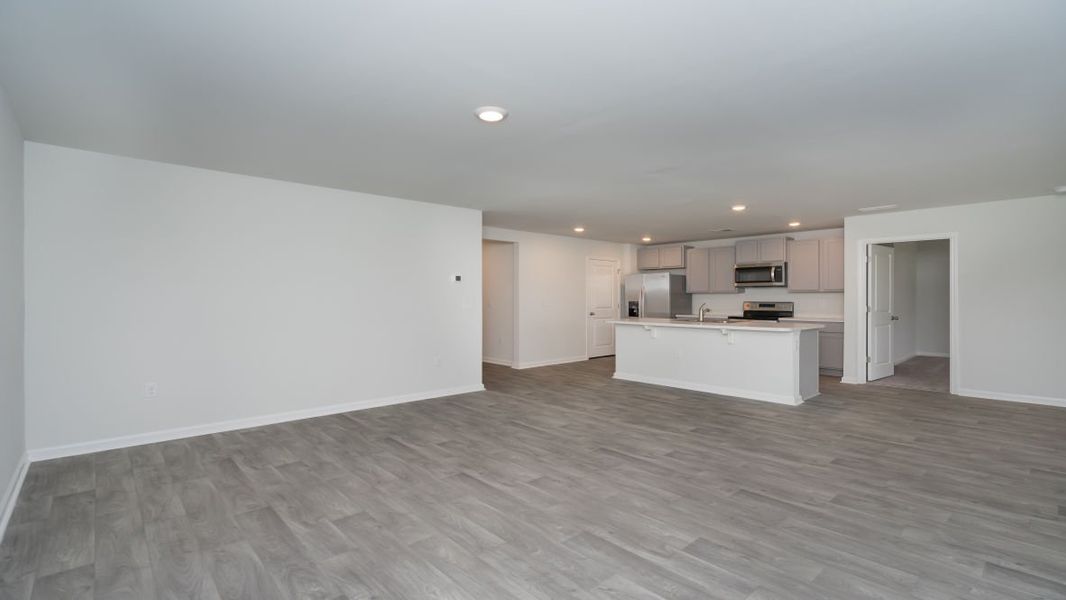Representative unfurnished interior of a home built from the ARIA by D.R. Horton in The Meadows at Wildwood Village, Shallotte (Image 22). Representative unfurnished interior of a home built from the ARIA by D.R. Horton in The Meadows at Wildwood Village, Shallotte (Image 22).