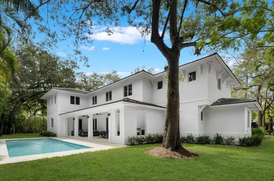 Front exterior of a new home in , South Miami, FL, highlighting curb appeal (Image 20). Front exterior of a new home in , South Miami, FL, highlighting curb appeal (Image 20).