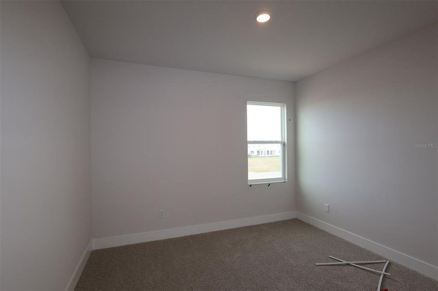 Spacious, unfurnished interior of a new home in Waterset Tradition Series, Apollo Beach (Image 32).