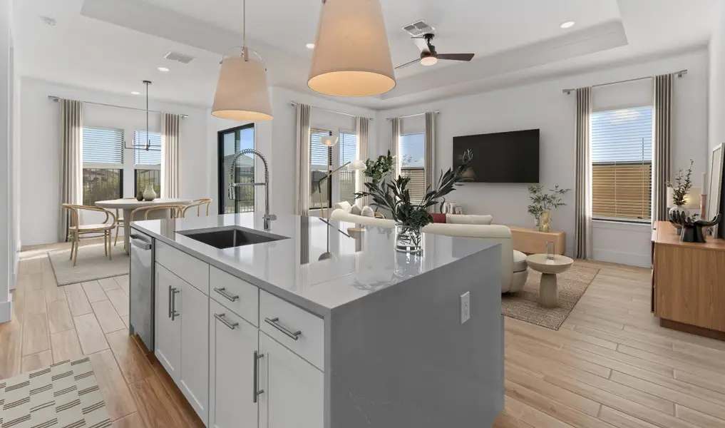 Kitchen with sleek waterfall-edge island Kitchen with sleek waterfall-edge island