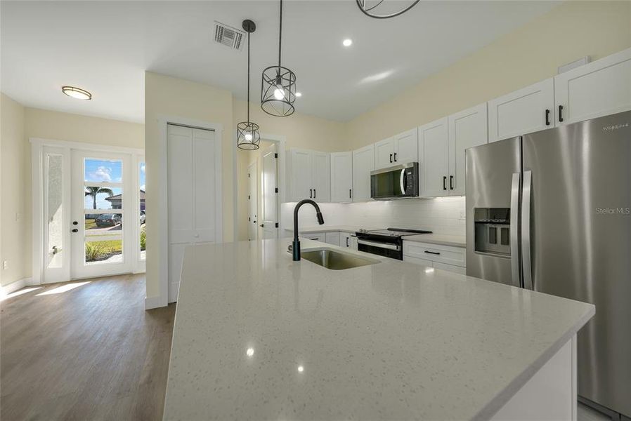 Furnished interior view inside a new home in , Cape Coral (Image 7). Furnished interior view inside a new home in , Cape Coral (Image 7).