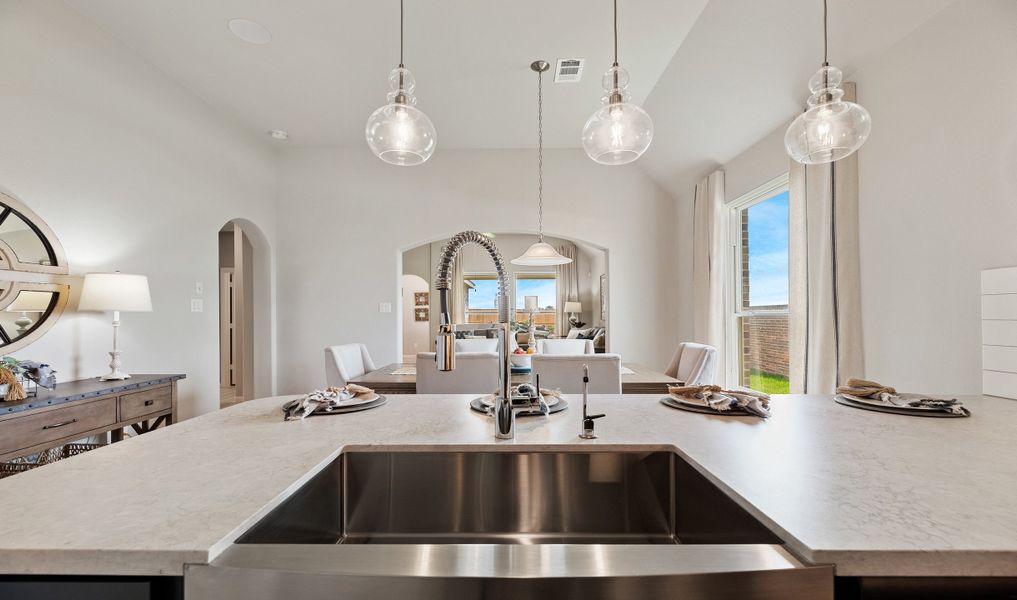 Kitchen overlooking dining area