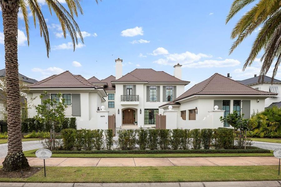 Front exterior of a new home in , Orlando, FL, highlighting curb appeal (Image 2).