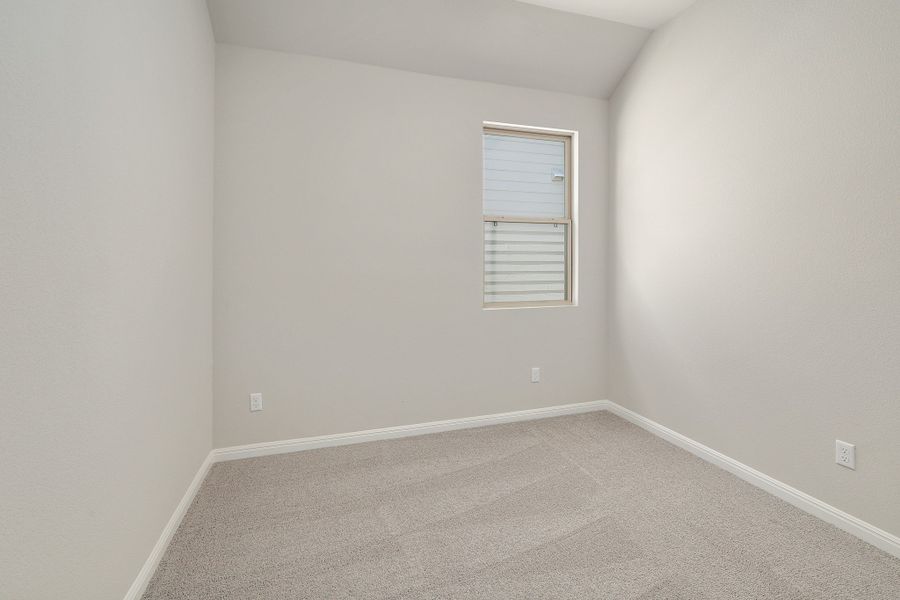 Bedroom in the Ash home plan by Trophy Signature Homes – REPRESENTATIVE PHOTO