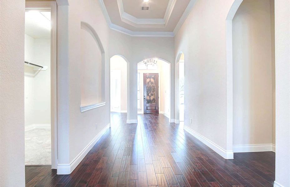 Representative unfurnished interior of a home built from the 3710 by Ravenna Homes in Artavia 70′, Conroe (Image 19).