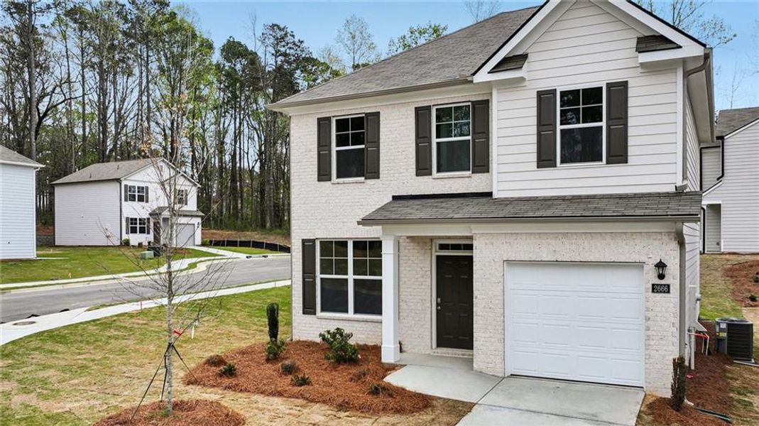 Front exterior of a new home in Sherwood Manor, College Park, GA, highlighting curb appeal (Image 23).