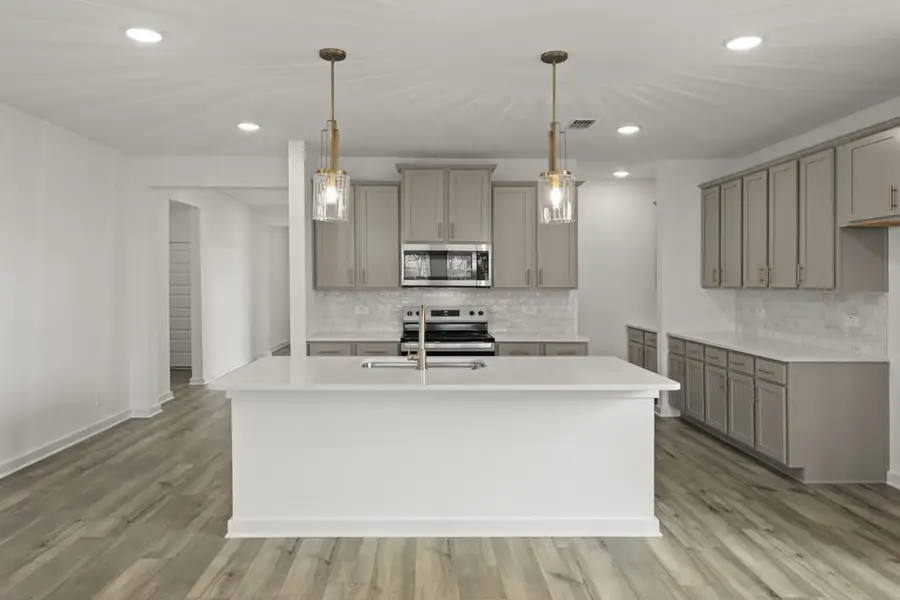 Representative furnished interior of a home built from the Olive III Katy Lakes 50s by Brohn Homes in Katy Lakes, Katy (Image 6).