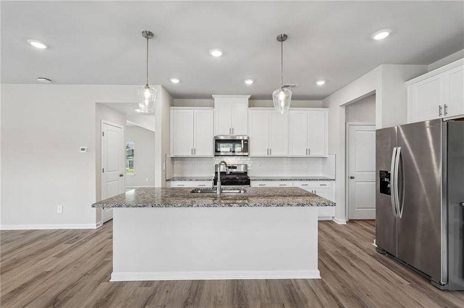 Furnished interior view inside a new home in Northwoods at Mirror Lake, Villa Rica (Image 4).