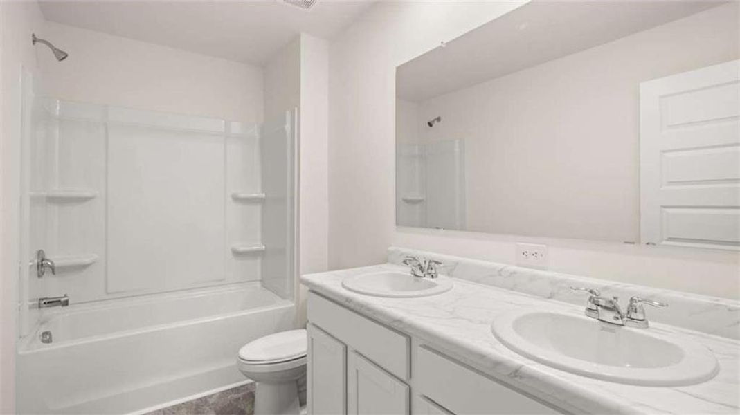 Furnished interior view inside a new home in Preserve at Dove Creek, Statham (Image 34).