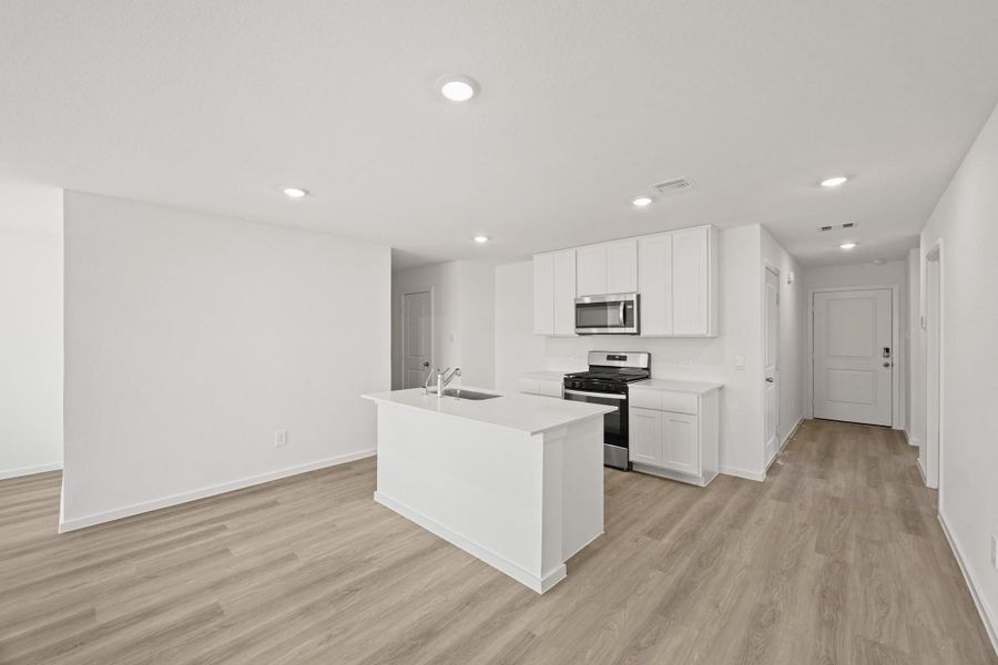 Furnished interior view inside a new home in Lexington Heights 50', Willis (Image 3).