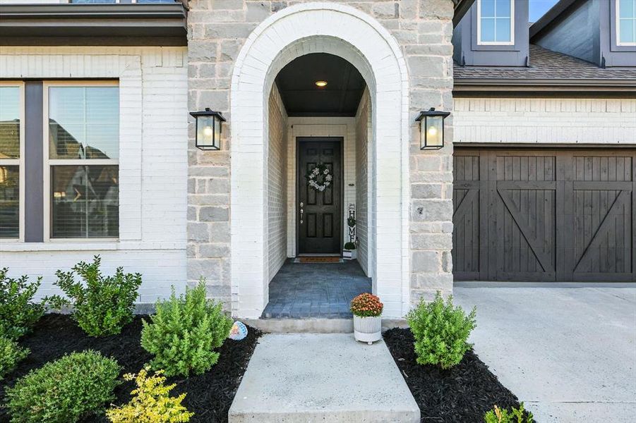 Front exterior of a new home in , Argyle, TX, highlighting curb appeal (Image 20). Front exterior of a new home in , Argyle, TX, highlighting curb appeal (Image 20).
