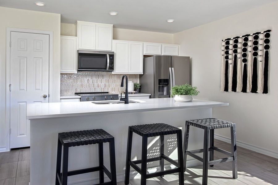 Representative furnished interior of a home built from the Plan 1676 Modeled by KB Home in Eagle Creek, Denton (Image 4). Representative furnished interior of a home built from the Plan 1676 Modeled by KB Home in Eagle Creek, Denton (Image 4).