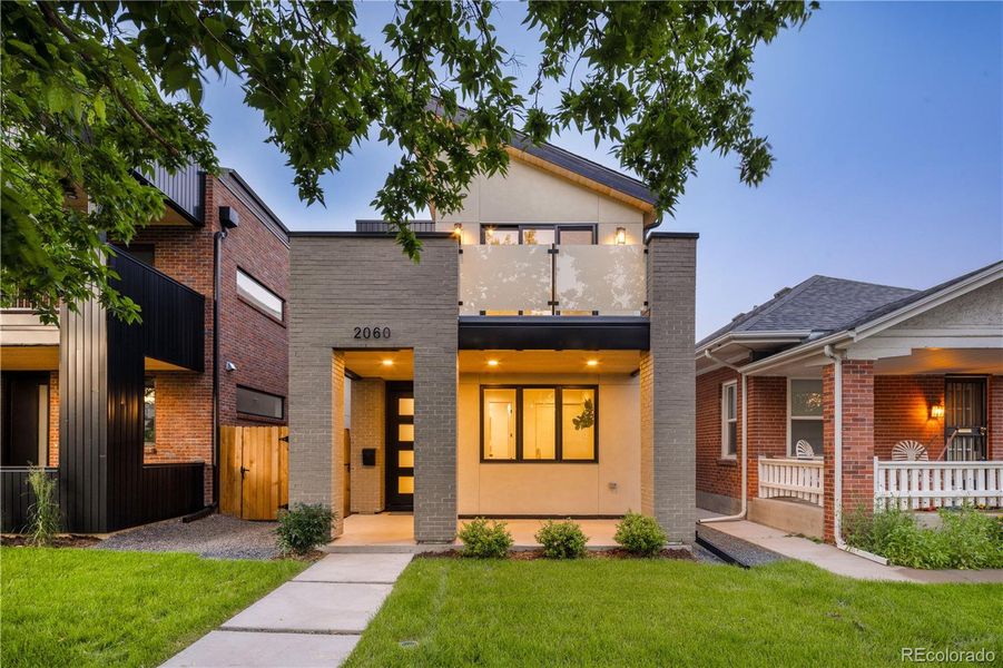 Front exterior of a new home in , Denver, CO, highlighting curb appeal (Image 21).